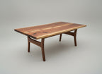 Wooden table with a natural finish on a gray background