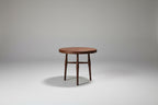 Wooden side table on a plain background
