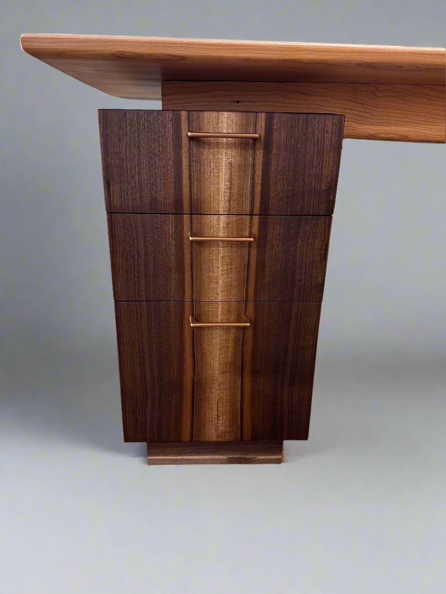 Wooden desk with a smooth finish on a gray background