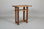 Wooden side table on a gray background