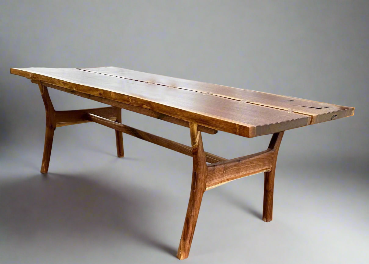 Wooden dining table on a gray background